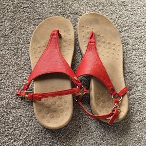 Kirra Red Leather T-Strap Sandals with Gold Accents